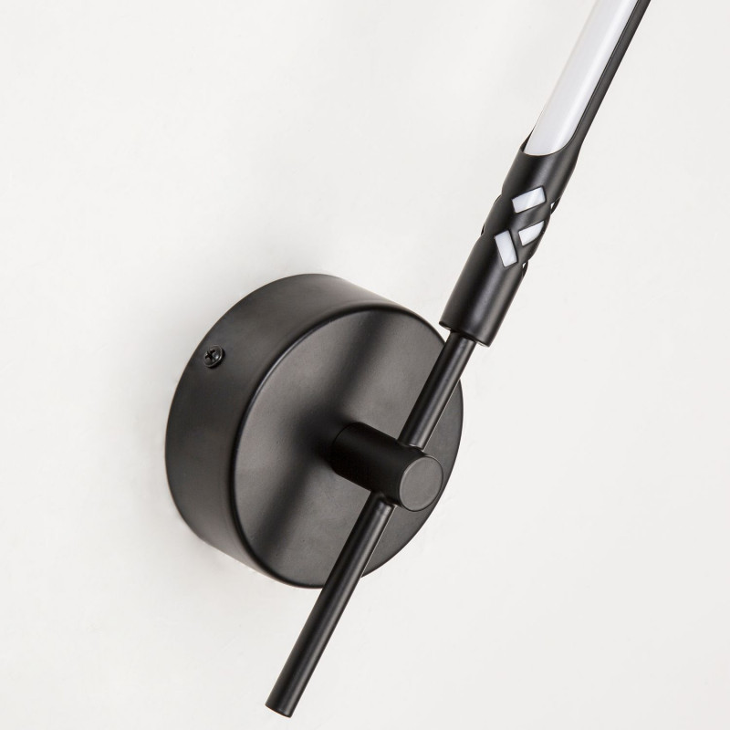 Бра Favourite Wand 4098-1W, D70*W100*H380, каркас матового черного цвета с декоративным узорным элементом, белый акриловый рассеиватель