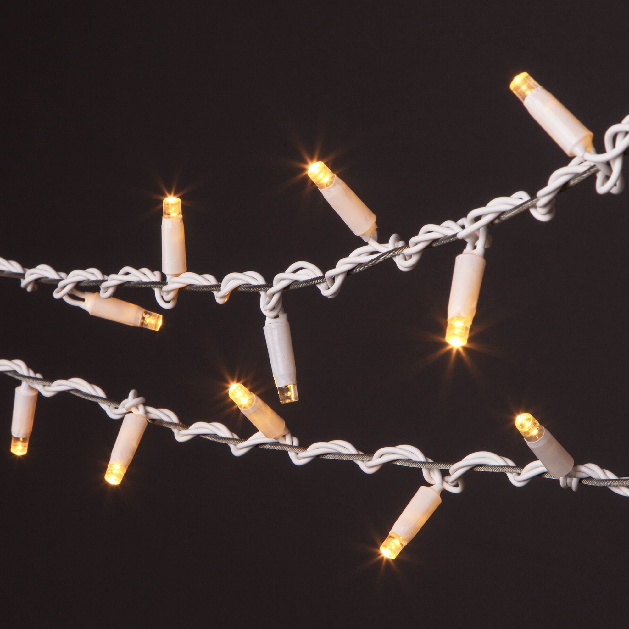 Гирлянда нить с мерцанием 10м IP65 1000 см Elektrostandard 400-101 теплый белый с эффектом мерцания 10м IP65