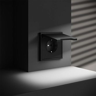Розетка встраиваемая Voltum S70 с заземлением, защитными шторками и крышкой 16А, черный матовый пластик Soft touch VLS040308